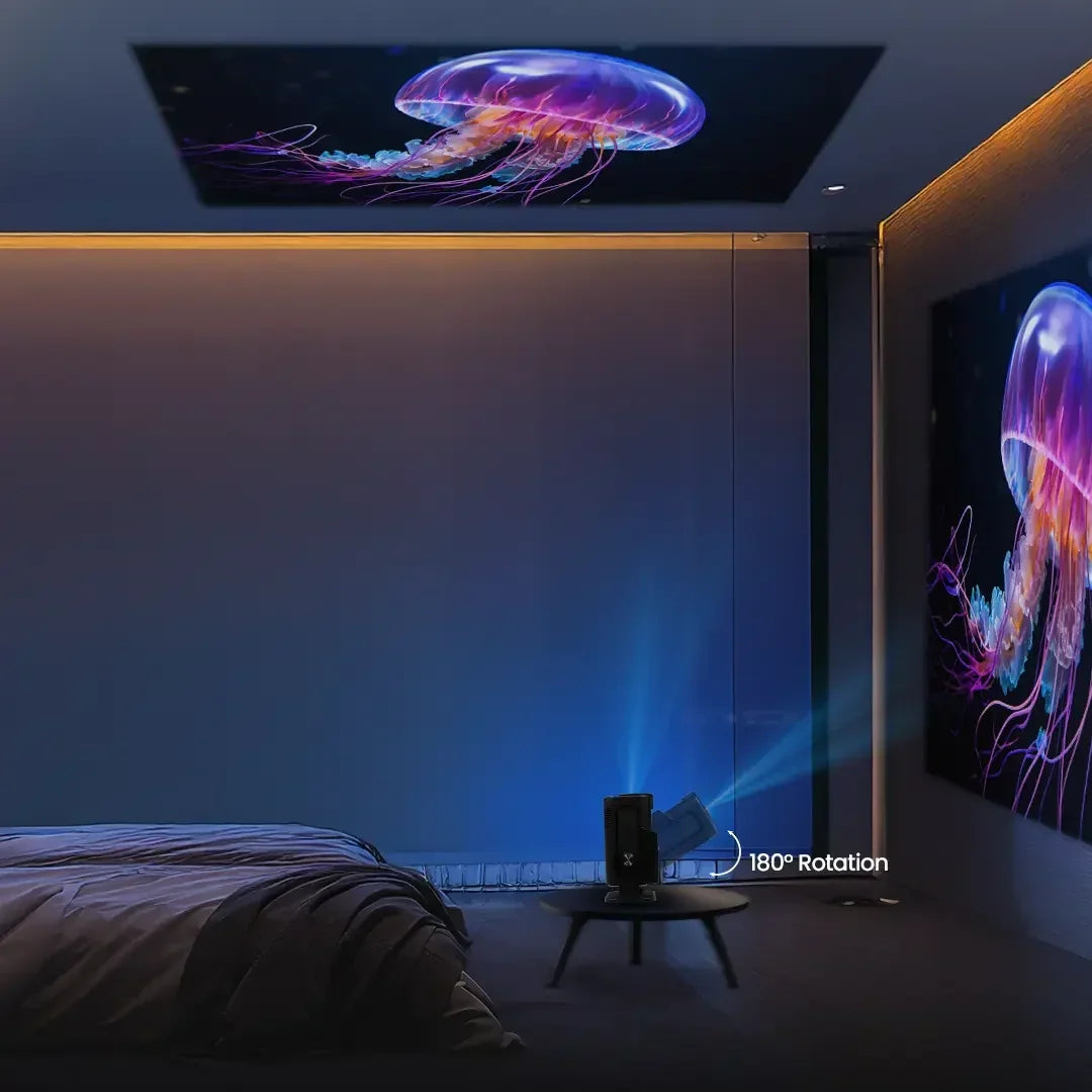 Compact projector with 180° rotation displaying vivid jellyfish image on wall and ceiling in bedroom.