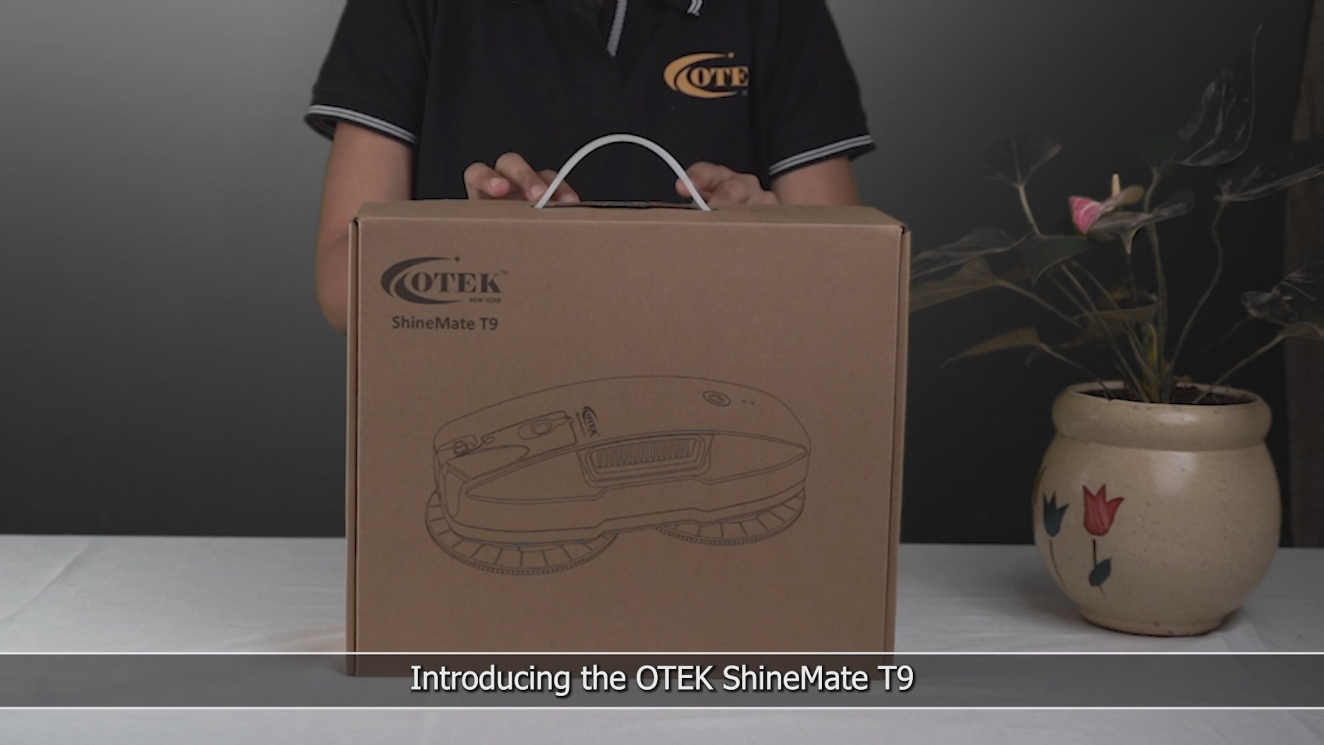 Load video: OTEKWORLD Robotic Window Cleaner in action on a glass window, providing hands-free, streak-free shine