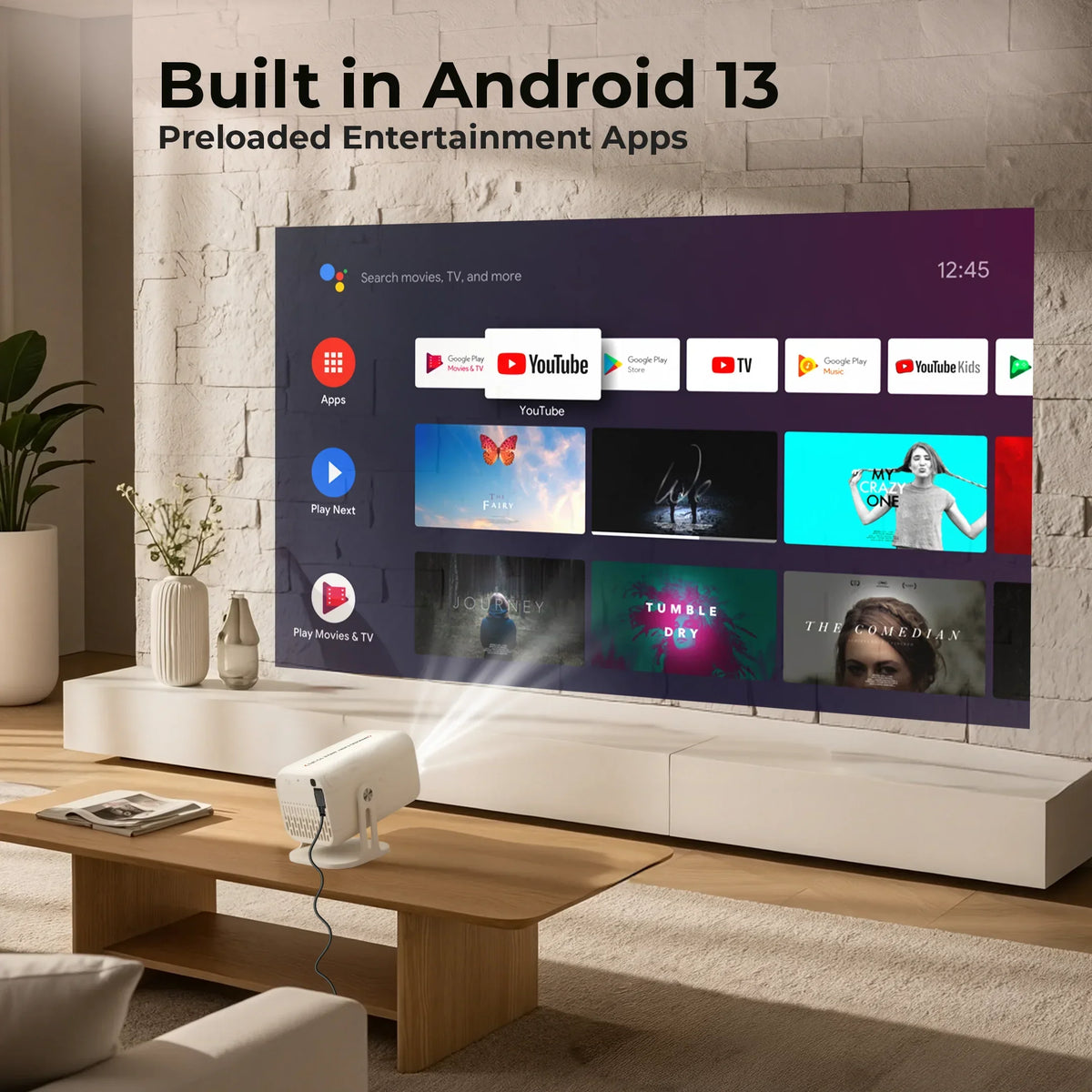 Home theater projector displaying Android 13 apps on wall in modern living room setting